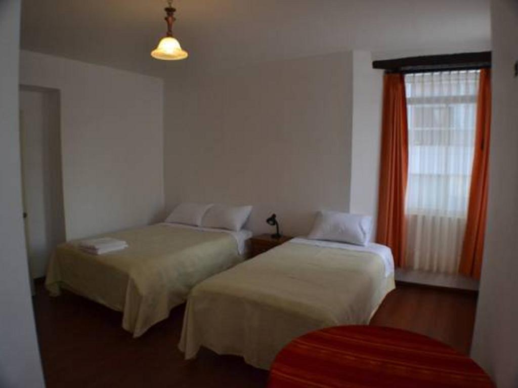 Heritage Inn Quito Quarto foto